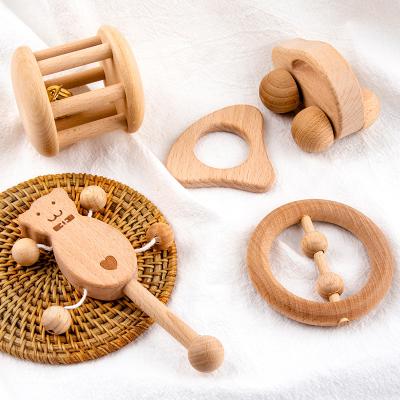 China Baby Newly Toy Wholesale Original Wooden Toy Kids Hand Bell Popular Wooden Toys Non-lacquer Environmental Molars Ratchet Toys Set for sale