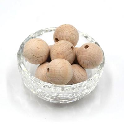 China Eco Friendly Unfinished Natural Food Grade Beech Material Round Wooden Beads for sale