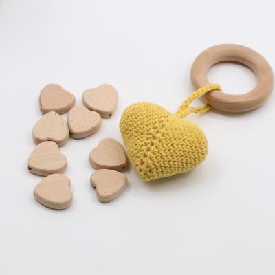 China Eco Friendly Free Sample Natural Color Heart Shape Wooden Teething Beads for sale