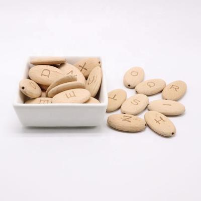 China Factory Supplier Eco Friendly Wholesale Oval Letter Wooden Baby Teething Beads for sale