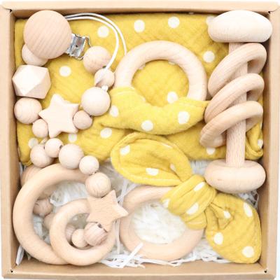 China Natural BPA Free Silicone Eco-Friendly Wooden Beads Baby Teething Bracelets Wooden Ring Rattle for sale