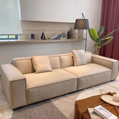 China Best Of Italy Craft Leather Sofa Italy Living Room Tufted Tofu Leisure Hotel Minimalism Modern Custom Made Blend Light Luxury Fabric for sale