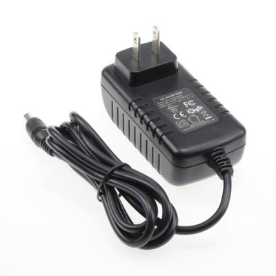 China AC to DC AC to DC Power Supply 12V 2A Iram Adapter 24W With Plug Plastic Case for sale