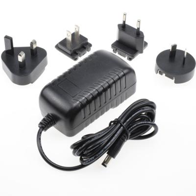 China Interchangeable EU US AU UK Plug 12V to 2.5A AC DC Power Adapter for Printer / LED Displays 93.5*46*41 mm for sale