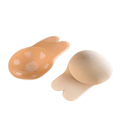 China Hot Sales Seamless Silicone Adhesive Rabbit Shape Bra With Lift Up Nipple Strapless Black And Nude Cloth Cover for sale