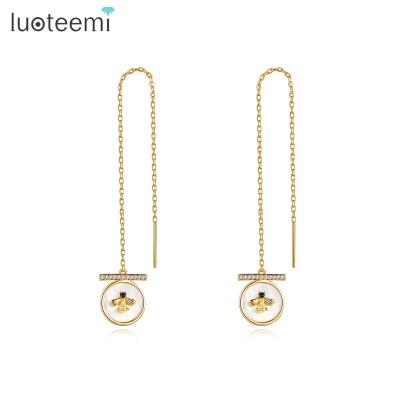 China FASHIONABLE LUOTEEMI Tending Autumn Tiktok New Arrival Designer Long 2021 Fashion Women's Long Wire Elegant Party Seashell Earring for sale