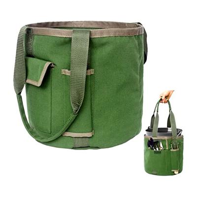 China Sturdy Outdoor Waterproof Multifunctional Canvas Garden Bucket Bag Large Capacity Folding Garden Bucket Bag for sale