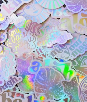 China Guangzhou decal waterproof UV stickers custom kawaii glossy die cut hologramphic UV transparent stickers cover anime label die cut stickers for sale