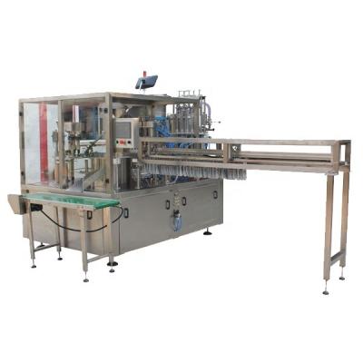 China Rotary Beverage T Type Automatic Premade Spout Pouch Filling And Capping Machine For Liquid for sale