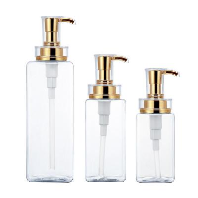 China MACTING Cosmetic Gold Cosmetic Bottle Transparent Scrub Square Bottle Shampoo Shower Gel Plastic Bottle for sale