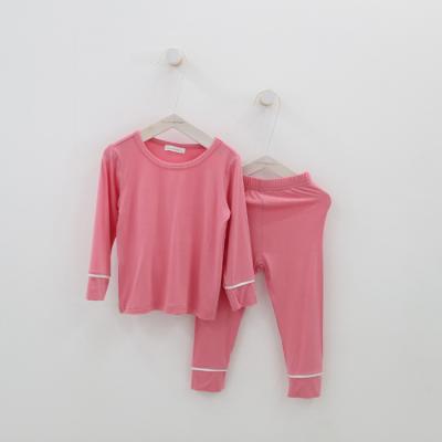 China Comfortable Breathable Children Home Wear Solid Color Cotton Modal Kids Pajama Sets for sale