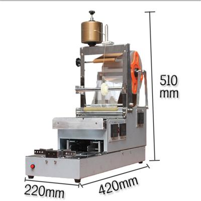 China Easy Work Low Price Food Tea Gift Paper Shrink Chocolate Wrapping Machine With Transparent Film Fold for sale