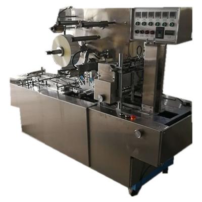 China Small Commodities Food Carton Box Film Packaging 3D Cellophane Wrapping Machine for sale