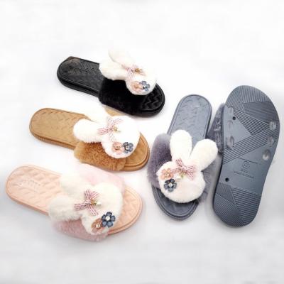 China Fashion trend ladies slips winter cotton shoes cute cartoon fluffy slippers for men and women cheap home furry shoes rubber non-slip slippers for sale