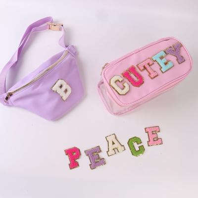 China DIY Handmade Running Pink A-Z Alphabet Embroidery Patch For Clothing Bag Improve Cute Chenille Self Adhesive Patches for sale