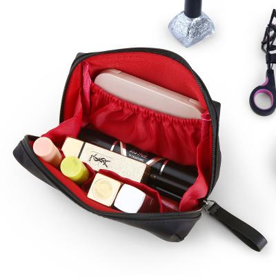 China Korean version of fashion small cosmetic bag female portable handheld mini bag of simple lipstick cosmetic bag for sale