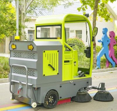 China food & Beverage Factory Electric Ride On Industrial Scrubber Road Sweeper Machine Ride-on Floor Sweeper With High Pressure Fog Gun for sale