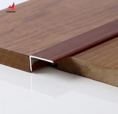 China Modern Right Angle Wood Effect Aluminum Tile Floor Trims Timber Floor Trim Transition Metal Strips for sale