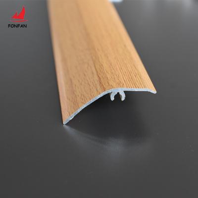 China Modern Wholesale Custom Wood Texture Transition Tarpaulin Profile Reducer Floor Pad Metal Strip Tile Aluminum Trim for sale