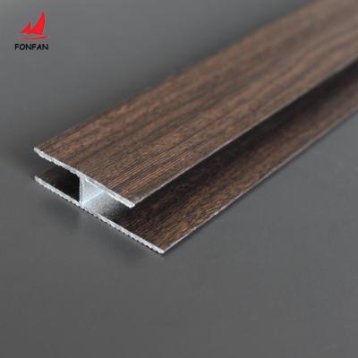 China Modern Hot Selling Dark Walnut H Shape Same Size Transition Profile Aluminum Roofing Decorative Strips Tile Trim Supplier for sale