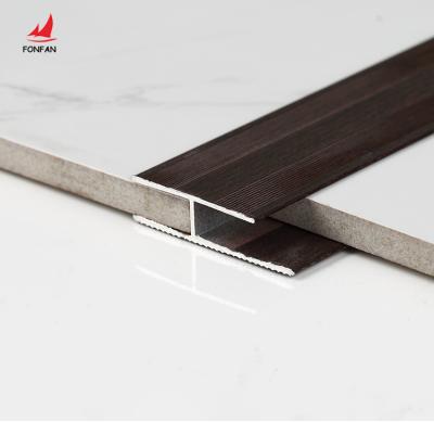 China Modern Metal Transition Profile H-Joint Cladding Profile Aluminum Wood Effect Floor Trim for sale