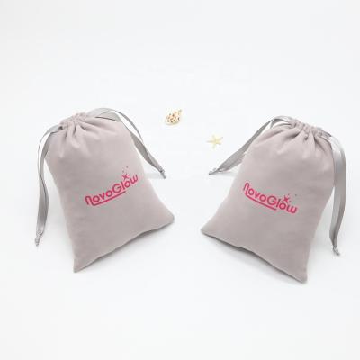 China Luxury Recyclable Gray Drawstring Velvet Jewelry Pouch High End Jewelry Velvet Packaging Bag With Ribbon for sale