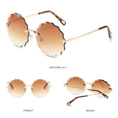 China Wholesale Round Shade Sunglasses For Women Shape To Cut Edge Round Sunglasses Gradient Rimless Sunglasses for sale