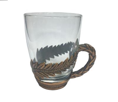 China Shot Glass with Skeleton Hand Shot Glass with Metal Base and Handle for sale