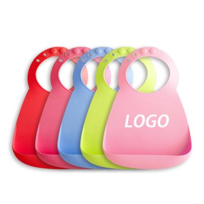 China BPA free 2022 hot selling silicone feeding bibs convenient unique silicone child bib for sale