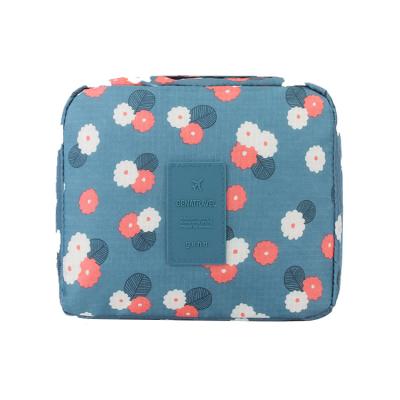 China Hot Selling Multi-Functional Portable Waterproof Wash Case Fashion Amazon Wholesale Travel Makeup Storage Floral Blue Pink Bag for sale