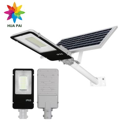 China ROAD HUAPAI Super Brightness Hot Sale 2 Years Warranty SMD Ip65 100w Outdoor Led Solar Street Light for sale