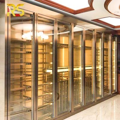 China Stored Wine Cabinet Gold Design Wine Cabinet Led Spotlight for sale