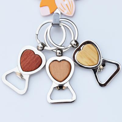 China Custom Laser Bamboo Keyring Keychains Luxury Wooden Unique Wooden Key Chain Manufacturer Logo Keyring for sale