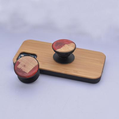 China Hot Selling Fashional Amazon Wooden Phone Holder Maple Resin Adjustable Wood Smartphone Stand for sale