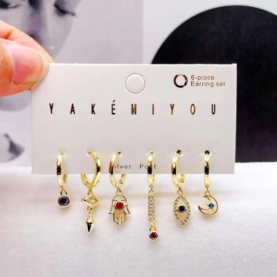 China New Design Yakemiyou CLASSIC Hand Shape Chaobao Lucky Eyes Dangle Jewelry Gold Plated Dangle Drop Earrings Set Gift For Women for sale