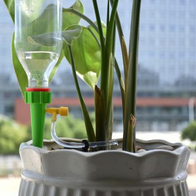 China Punch Bottom Bottle Drip Irrigation System Watering Indoor Plant Adjustable Automatic Cooling System For Flowerpot Irrigation for sale