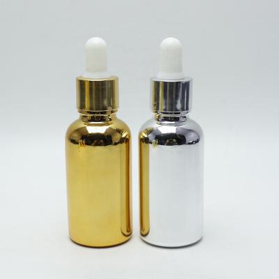 China 5ml 10ml 15ml 20ml 30ml 50ml 100ml 30ml 1oz Cosmetic Gold Silver Dropper Glass Bottles For Essential Oil Serum Round-43S for sale