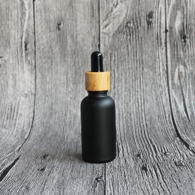 China Personal Care 30ml Black Frosted Glass Dropper Bottles With Black Glass Oil Bottles Wholesale Dropper Cap Essential Oil Safe For Beard Kids for sale