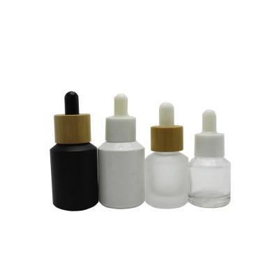 China Cosmetic Wholesale Glass Pipette 30ml Serum Essential Oil Glass Dropper Bottles Round-62S for sale