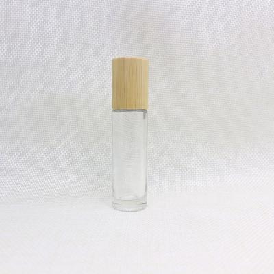 China Personal Care 10ml Clear Glass Roller Bottles Empty Essential Oil Lip Balm Roll On With Bamboo Cap RB-147T for sale