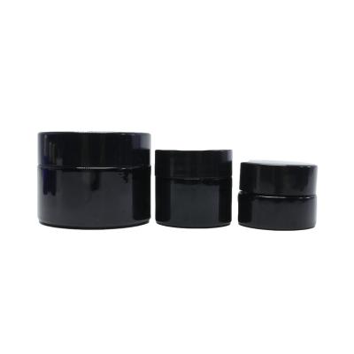 China 5ml 10ml 15ml 20ml 30ml 50ml 100ml Mini Black Glass Cream Cosmetic Jar with Black Plastic Lids GJ-17S for sale