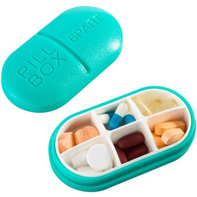 China Plastic Storage Box Clamshell Mini Portable Home Carry-On Combed Pill Case For Storage for sale