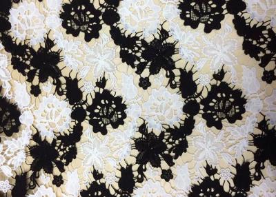 China Polyester Embroidered Lace Fabric With Black And White Floral Pattern For Apparel for sale