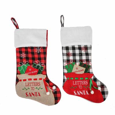 China 2021 New Arrival Fabric Customize Luxury Polyester Christmas Tree Candy Bag Santa Fireplace Christmas Stocking for sale