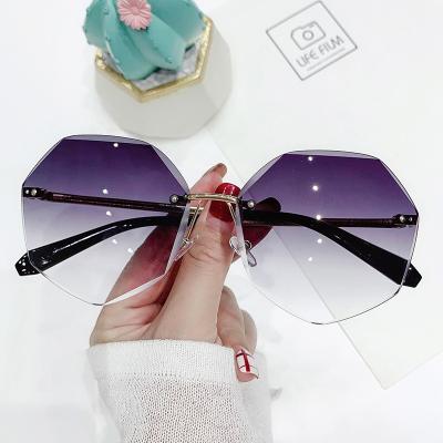 China Eyewear Trade Women Rimless Sunglasses Design Lady Sun Glasses Vintage Fashion Alloy Designer Shades Uv 400 Classic Eyewear for sale