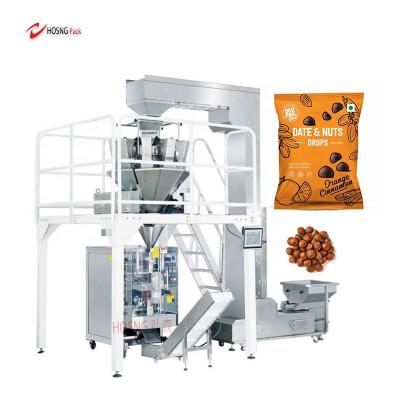 China Automatic 1kg Food Polythene Roll Film Squirrel Nuts Filling And Packing Machine Packing Filling Machine Candy for sale