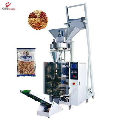 China Chemical Full Automatic Small Granule Snack Packing Machine Vertical Automatic Filling Machines With Measuring Cups For Granule for sale