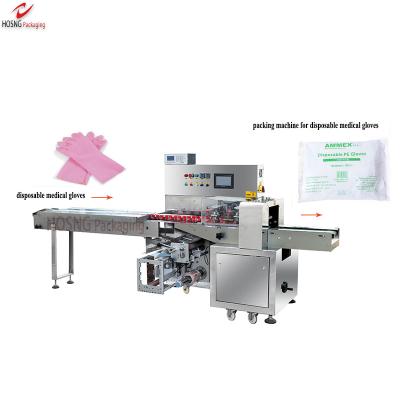 China Horizontal Food Down-Roll Film Packaging Machine Packing Machine For Disposable Medical Gloves Pillow Type for sale