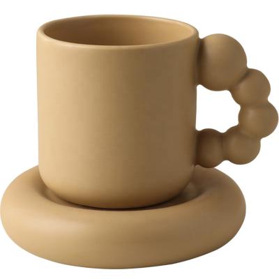 China Institut Lelyi Rotating Ball Handle Design Mug Nordic Ceramic Cup Viable Big Fat Mug for sale