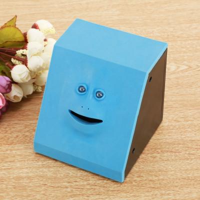 China Newest Lelyi Plastic Design Gifts Creative Face Eating Coin Saving Box Face Money Bank Crawling Piggy Bank for sale